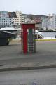 Bryggen rote alte Telefonzelle vor Bryggen