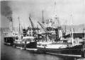 DS KONG HAAKON in Bergen (1925), dahinter DS VENUS (das Schiff dahinter ist unbekannt), auf der rechten Kaiseite im Hintergrund DS STAVANGERFJORD / public domain - Fotograf: Anders Beer Wilse/Norwegian Museum of Cultural History